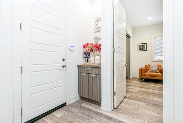 20512 W Esmeralda Ln, Porter Ranch, CA 91311 - foyer with light wood finished floors and baseboards