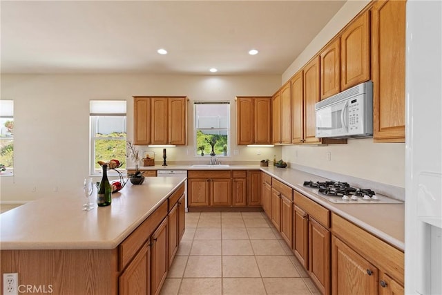 5536 Breckenridge Ave, Banning, CA 92220 - kitchen featuring white appliances, a sink, plenty of natural light, light countertops, and recessed lighting