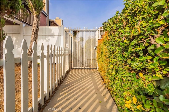 exterior space with a gate and fence