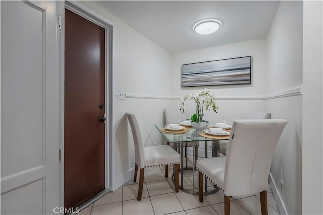 tiled dining area with baseboards