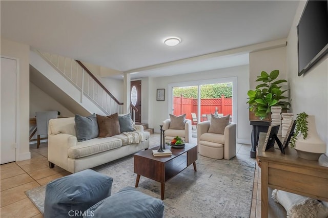 11249 Ferina St, Norwalk, CA 90650 - living area featuring tile patterned flooring and stairs