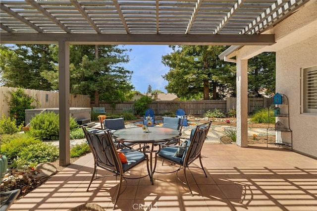 view of patio with a pergola, outdoor dining area, and a fenced backyard