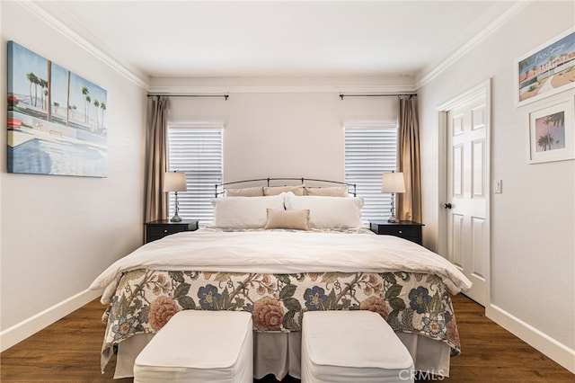 bedroom featuring wood finished floors, baseboards, and ornamental molding