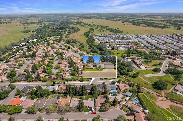 drone / aerial view with a residential view