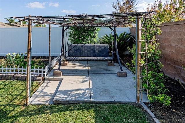 view of patio with a pergola and a fenced backyard