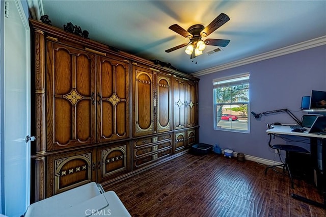 home office featuring ornamental molding, dark wood-type flooring, ceiling fan, and baseboards