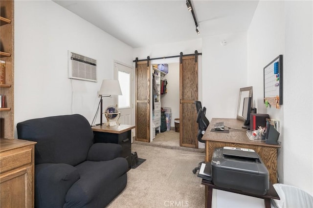 344 E Birch Ave, Hanford, CA 93230 - office area featuring a barn door, track lighting, a wall mounted AC, and light colored carpet