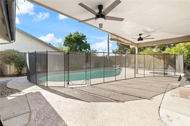 344 E Birch Ave, Hanford, CA 93230 - view of swimming pool featuring a fenced backyard, a patio area, a ceiling fan, and a fenced in pool