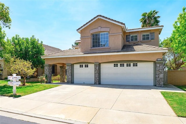 2811 Westbourne Pl, Rowland Heights, CA 91748 - traditional-style house with driveway, stone siding, a tiled roof, a garage, and stucco siding