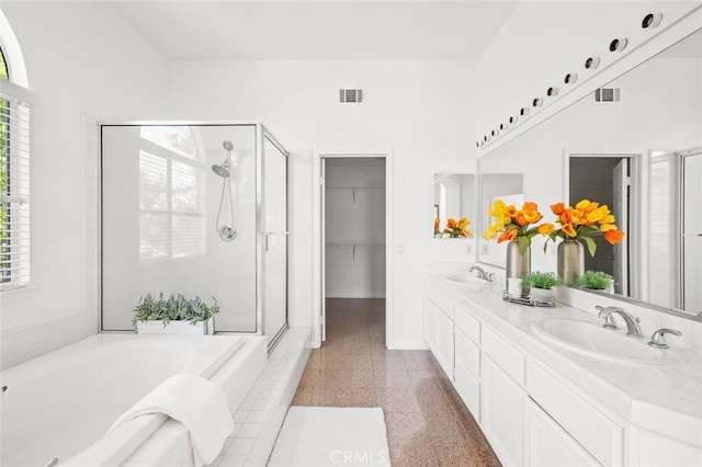 2811 Westbourne Pl, Rowland Heights, CA 91748 - full bath with baseboards, a sink, visible vents, and a stall shower