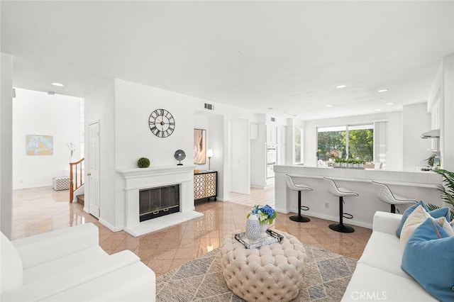 2811 Westbourne Pl, Rowland Heights, CA 91748 - living area with recessed lighting, a glass covered fireplace, visible vents, and baseboards
