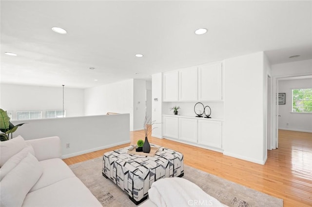 2811 Westbourne Pl, Rowland Heights, CA 91748 - living room with recessed lighting, light wood-style floors, and baseboards