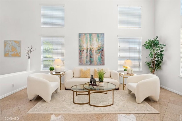 2811 Westbourne Pl, Rowland Heights, CA 91748 - living area featuring baseboards, granite finish floor, and a towering ceiling