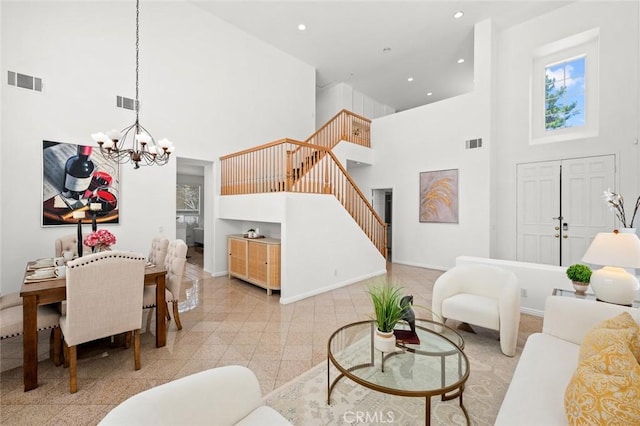 2811 Westbourne Pl, Rowland Heights, CA 91748 - living area with stairway, a high ceiling, a chandelier, and visible vents