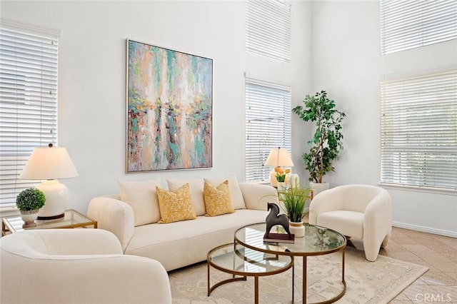 2811 Westbourne Pl, Rowland Heights, CA 91748 - living room with a healthy amount of sunlight, a towering ceiling, and baseboards