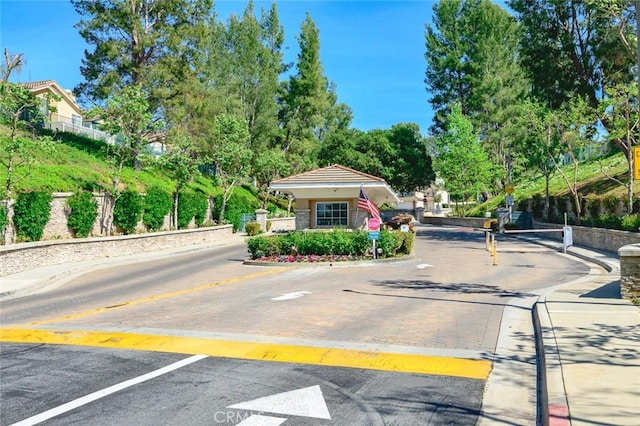 2811 Westbourne Pl, Rowland Heights, CA 91748 - view of road with a gated entry, curbs, and sidewalks
