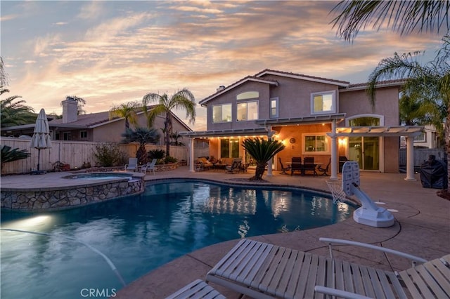 view of pool with a fenced backyard, a pergola, outdoor lounge area, a patio area, and outdoor dining area