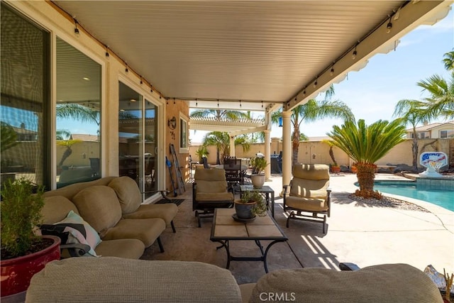view of patio with a fenced backyard, an outdoor living space, and a fenced in pool