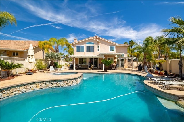 view of pool featuring a fenced in pool, a fenced backyard, a pergola, an in ground hot tub, and a patio