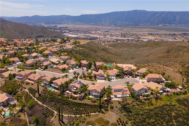 birds eye view of property with a residential view and a mountain view