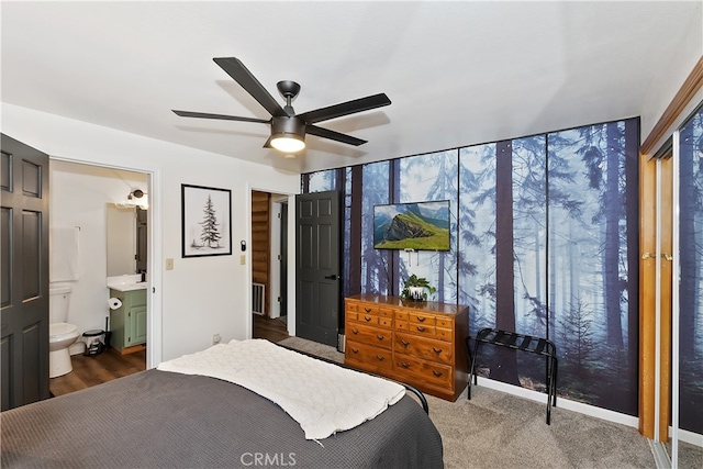 bedroom with ceiling fan and ensuite bathroom