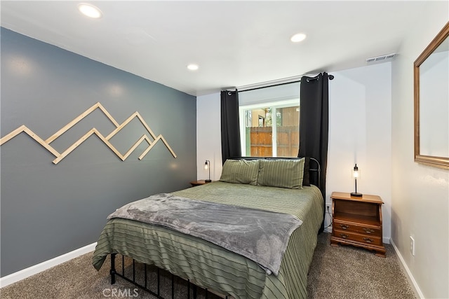 bedroom featuring baseboards, recessed lighting, visible vents, and carpet
