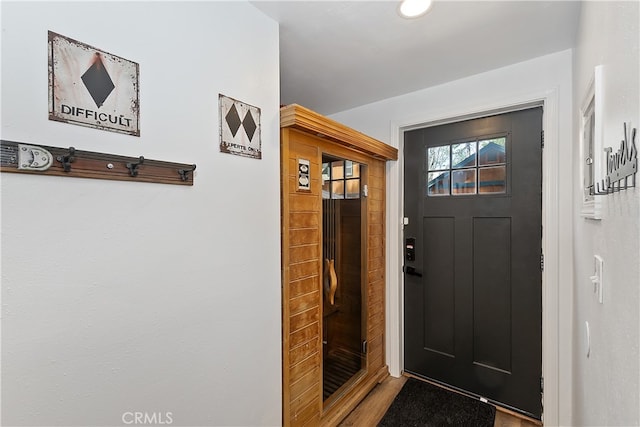 doorway with wood finished floors