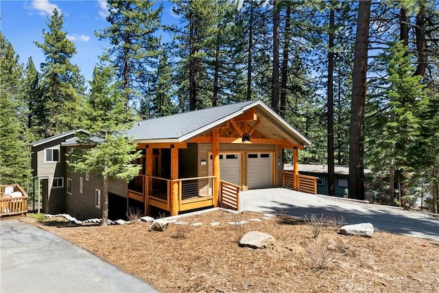 867 Clement St, South Lake Tahoe, CA 96150 - view of front of property with a porch and driveway