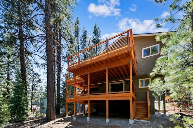 867 Clement St, South Lake Tahoe, CA 96150 - back of property with a deck and stairs