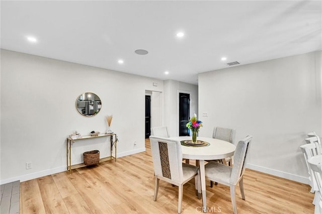 12643 Gladstone Ave, Sylmar, CA 91342 - dining space featuring baseboards, light wood-style floors, visible vents, and recessed lighting