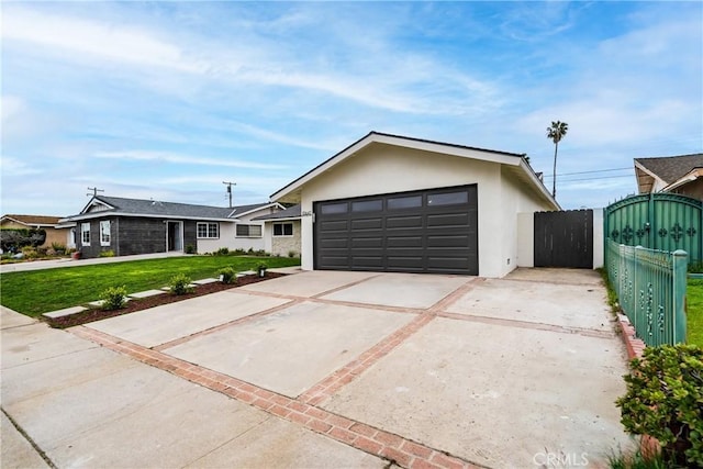 ranch-style house with fence, stucco siding, a front yard, a gate, and driveway