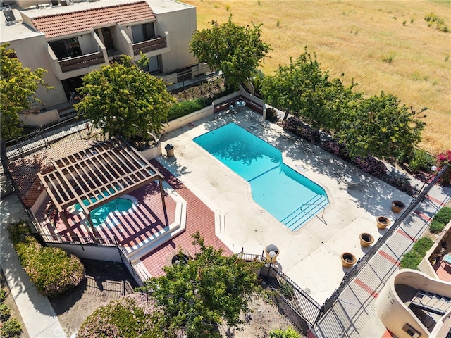 2265 Bradford Ave Unit 516, Highland, CA 92346 - aerial view of property and surrounding area featuring a pool area