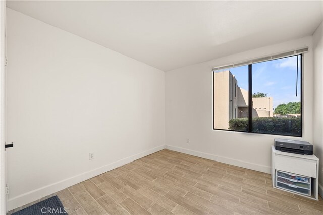 2265 Bradford Ave Unit 516, Highland, CA 92346 - empty room featuring baseboards and wood finished floors
