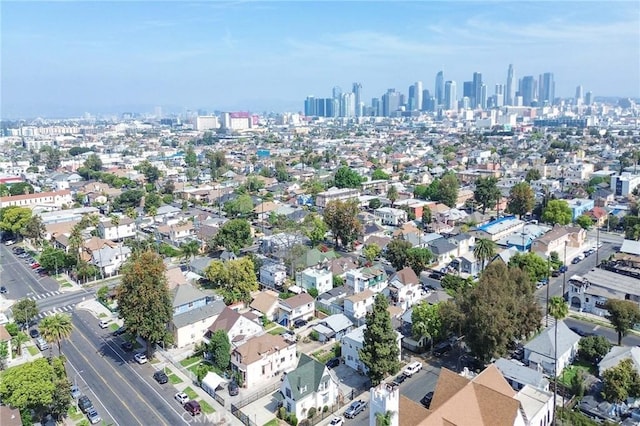 927 E 28th St, Los Angeles, CA 90011 - aerial overview of property's location with a view of skyline