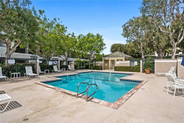 230 Lille Ln Unit 214, Newport Beach, CA 92663 - pool featuring fence and a patio