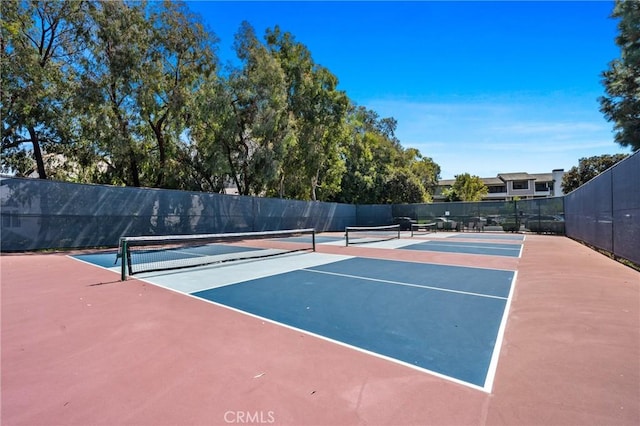 230 Lille Ln Unit 214, Newport Beach, CA 92663 - view of tennis court featuring fence and community basketball court
