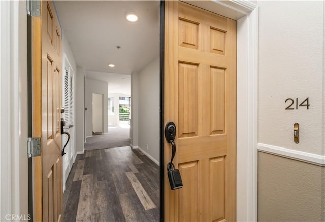 230 Lille Ln Unit 214, Newport Beach, CA 92663 - hall featuring baseboards, dark wood-style floors, and recessed lighting