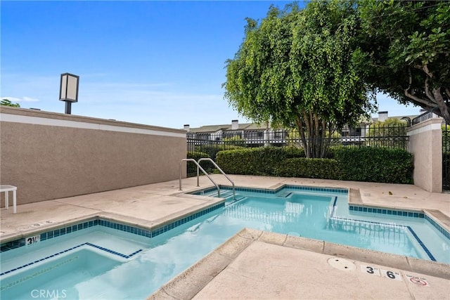 230 Lille Ln Unit 214, Newport Beach, CA 92663 - view of swimming pool featuring fence, a patio area, and a fenced in pool