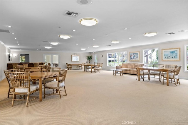230 Lille Ln Unit 214, Newport Beach, CA 92663 - dining area featuring light colored carpet, ornamental molding, visible vents, and recessed lighting