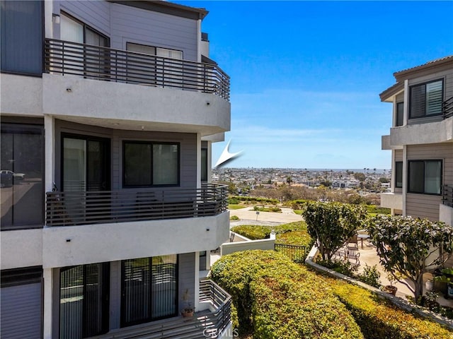 230 Lille Ln Unit 214, Newport Beach, CA 92663 - view of property exterior featuring a balcony