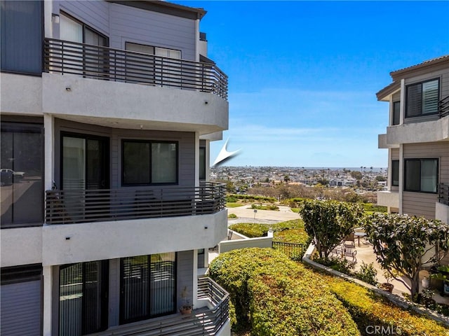 230 Lille Ln Unit 214, Newport Beach, CA 92663 - view of side of property featuring a balcony