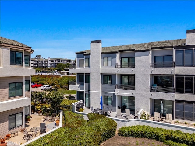 230 Lille Ln Unit 214, Newport Beach, CA 92663 - view of apartment building / complex