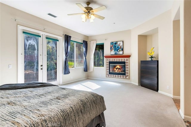 bedroom featuring access to outside, french doors, carpet, baseboards, and visible vents