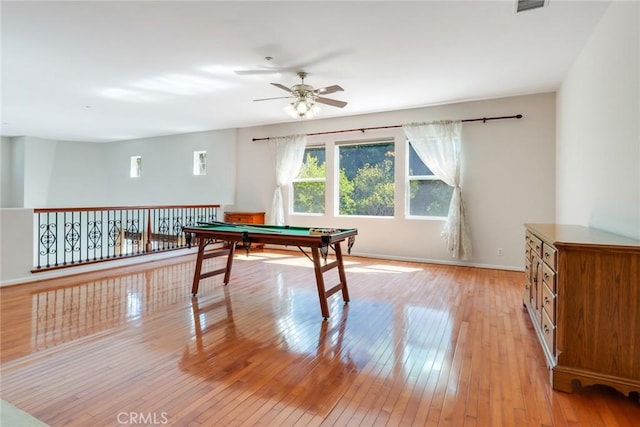 game room featuring light wood-style floors, billiards, baseboards, and a ceiling fan