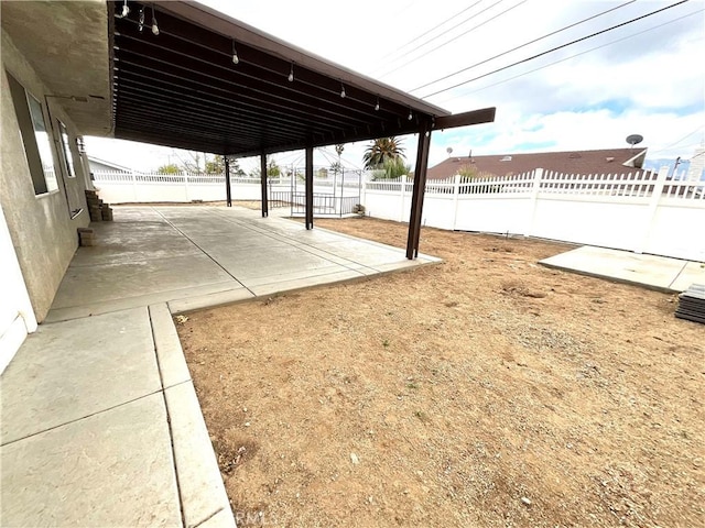 1078 W King St, Banning, CA 92220 - view of yard featuring a patio and a fenced backyard