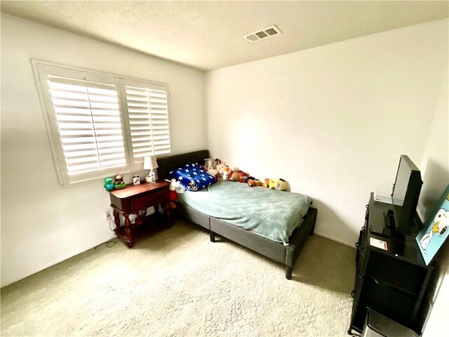 1078 W King St, Banning, CA 92220 - carpeted bedroom with visible vents