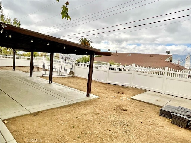 1078 W King St, Banning, CA 92220 - view of patio featuring fence