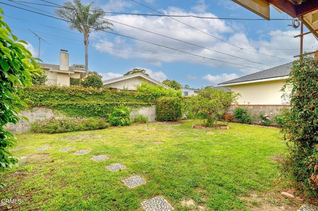 view of yard with fence