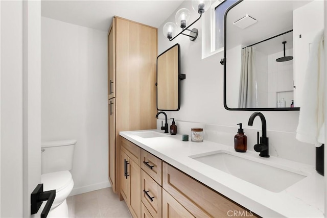 2343 E Athens Ave, Orange, CA 92867 - bathroom featuring a sink, tile patterned flooring, toilet, and double vanity