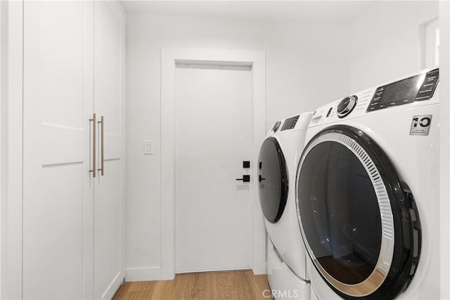 2343 E Athens Ave, Orange, CA 92867 - laundry room featuring laundry area, light wood-type flooring, and independent washer and dryer